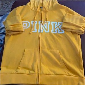 a yellow zip up hoodie from pink